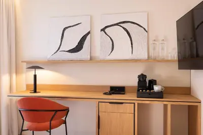 Cuisine ou kitchenette dans l'établissement Alberte Hôtel