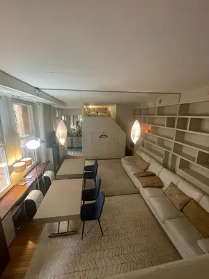 Coin salon dans l'établissement Élégant studio avec mezzanine porte des Ternes
