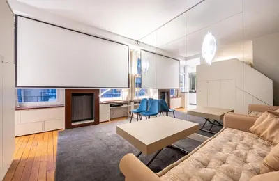 Coin salon dans l'établissement Élégant studio avec mezzanine porte des Ternes