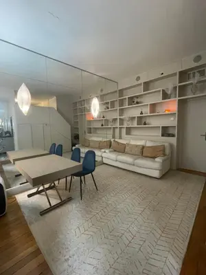 Coin salon dans l'établissement Élégant studio avec mezzanine porte des Ternes