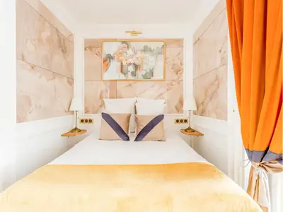 Un ou plusieurs lits dans un hébergement de l'établissement Merveil -Luxury Serviced Apartment-Saint Martin II