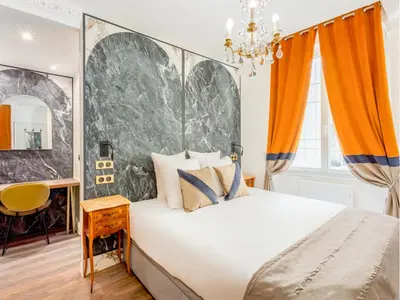 Un ou plusieurs lits dans un hébergement de l'établissement Merveil -Luxury Serviced Apartment-Saint Martin II