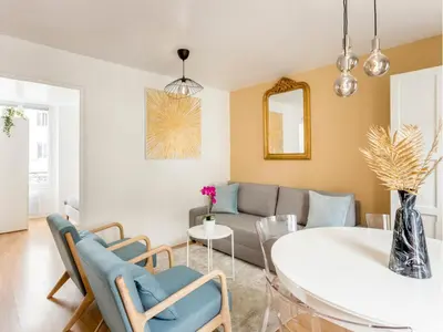 Coin salon dans l'établissement Merveil - Family Suite - Marais - Martin V