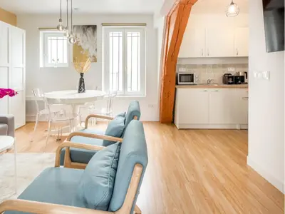 Cuisine ou kitchenette dans l'établissement Merveil - Family Suite - Marais - Martin V