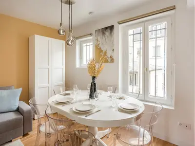 Coin salon dans l'établissement Merveil - Family Suite - Marais - Martin V