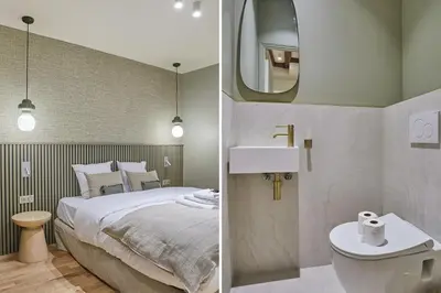 Un ou plusieurs lits dans un hébergement de l'établissement Residence Center of Paris by Studio prestige
