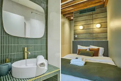 Un ou plusieurs lits dans un hébergement de l'établissement Residence Center of Paris by Studio prestige