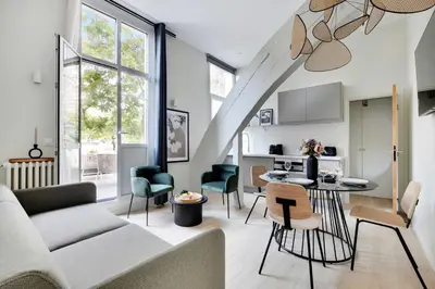 Coin salon dans l'établissement Flat with Terrasse - 1BR-4P - Eiffel Tower