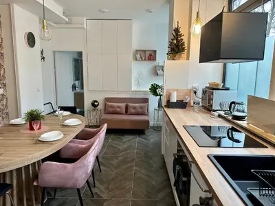 Cuisine ou kitchenette dans l'établissement Logement GUÉNOT pour 5 personnes sur Paris 11