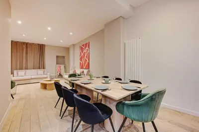 Coin salon dans l'établissement Spacious apartment - 4BR-15P - Sentier-Grand Rex