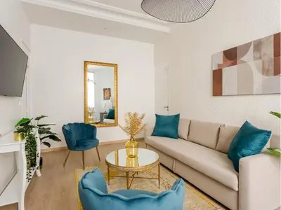 Coin salon dans l'établissement Merveil - Family Suite - Champs Elysees - Wagram