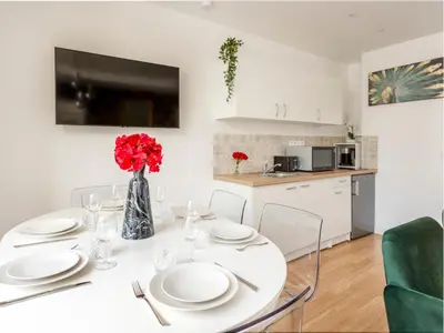 Cuisine ou kitchenette dans l'établissement Merveil - Family Suite - Marais - Martin VI
