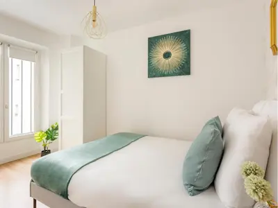 Un ou plusieurs lits dans un hébergement de l'établissement Merveil - Family Suite - Marais - Martin VI