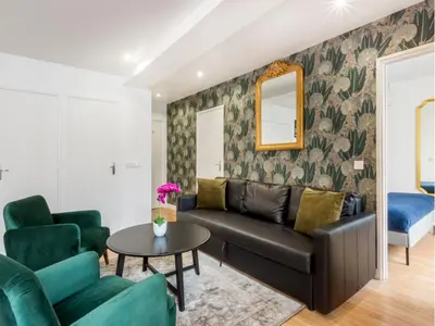 Coin salon dans l'établissement Merveil - Family Suite - Marais - Martin VI