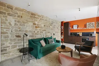 Coin salon dans l'établissement Pick A Flat's Apartment near place de la Bastille - Rue du Faubourg Saint Antoine