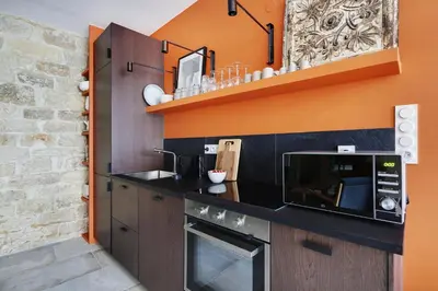 Cuisine ou kitchenette dans l'établissement Pick A Flat's Apartment near place de la Bastille - Rue du Faubourg Saint Antoine