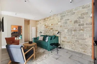 Coin salon dans l'établissement Pick A Flat's Apartment near place de la Bastille - Rue du Faubourg Saint Antoine