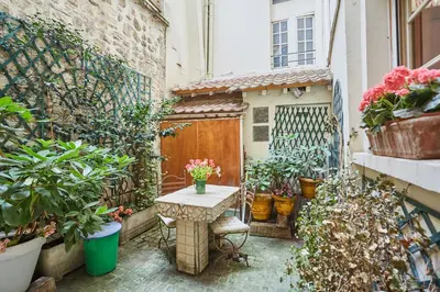 Jardin de l'établissement Apartment in heart of Marais by Studio prestige