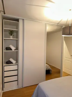 Un ou plusieurs lits dans un hébergement de l'établissement Super appartement refait à neuf beaucoup de charme