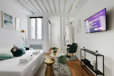 Un ou plusieurs lits dans un hébergement de l'établissement Magnificent studio - 2P - Les Halles
