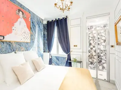 Un ou plusieurs lits dans un hébergement de l'établissement Merveil - Luxury Suite - Opera - Septembre I