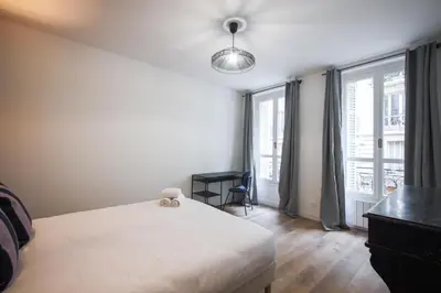 Un ou plusieurs lits dans un hébergement de l'établissement 1#Appart 4Pers#2 Chambres#Commerce#FullEquipped#AC