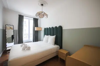 Un ou plusieurs lits dans un hébergement de l'établissement 2#Appart 6Pers#2 Chambres#Commerce#FullEquipped#AC