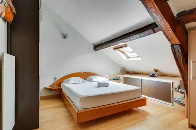 Un ou plusieurs lits dans un hébergement de l'établissement Duplex calme et lumineux au cœur de Bastille