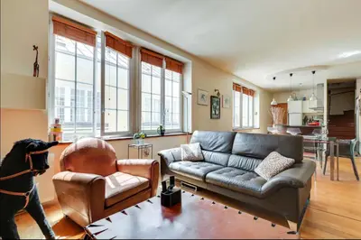 Coin salon dans l'établissement Duplex calme et lumineux au cœur de Bastille