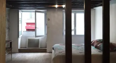 Un ou plusieurs lits dans un hébergement de l'établissement HAUSSMANN ESPACE
