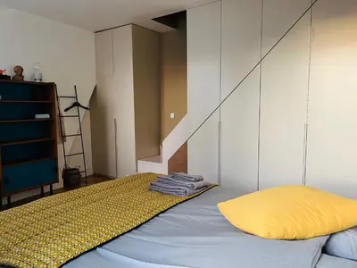 Un ou plusieurs lits dans un hébergement de l'établissement Marais - Appartement sur les toits