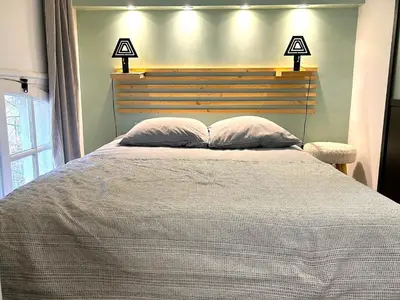 Un ou plusieurs lits dans un hébergement de l'établissement Loft Varenne