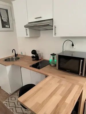 Cuisine ou kitchenette dans l'établissement Un studio au sacré cœur Montmartre