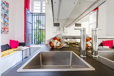 Cuisine ou kitchenette dans l'établissement Amazing studio 2P - Place Saint Georges/ Martyrs