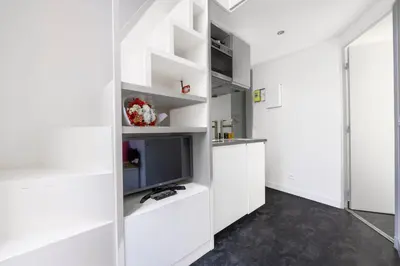 Cuisine ou kitchenette dans l'établissement Amazing studio 2P - Place Saint Georges/ Martyrs