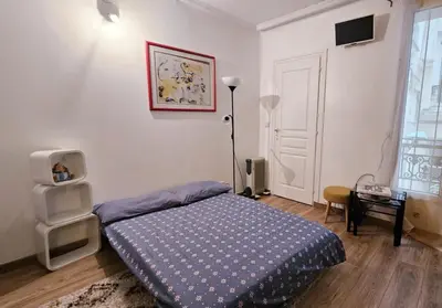Un ou plusieurs lits dans un hébergement de l'établissement studio au cœur Montmartre