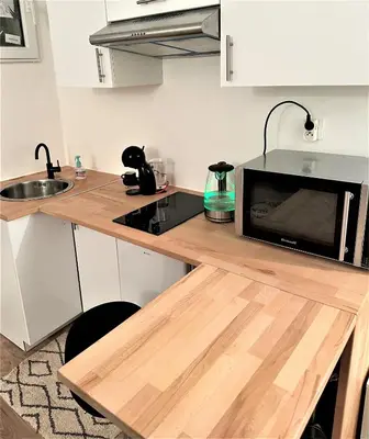 Cuisine ou kitchenette dans l'établissement studio au cœur Montmartre