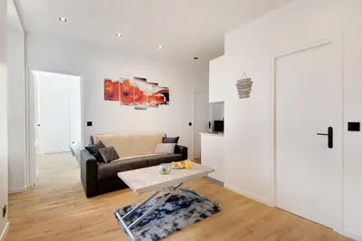 Coin salon dans l'établissement Appartement - Stade de France