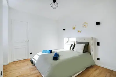 Un ou plusieurs lits dans un hébergement de l'établissement Appartement - Stade de France