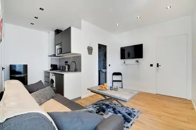 Cuisine ou kitchenette dans l'établissement Appartement - Stade de France