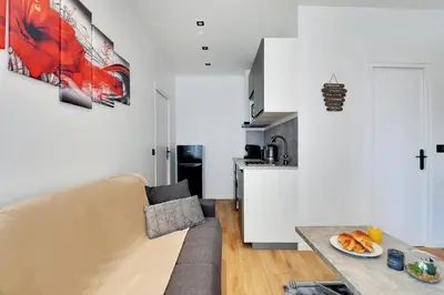 Cuisine ou kitchenette dans l'établissement Appartement - Stade de France