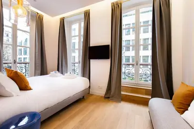 Un ou plusieurs lits dans un hébergement de l'établissement Sumptuous apartment - 1BR-6P - Bourse