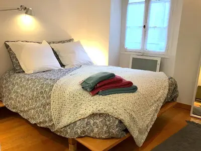 Un ou plusieurs lits dans un hébergement de l'établissement L'appartement Vaugirard