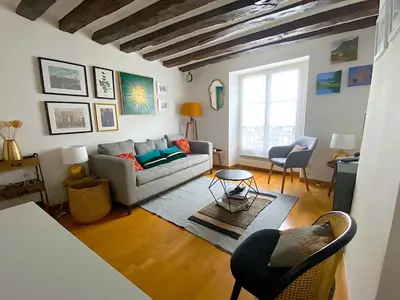 Coin salon dans l'établissement L'appartement Vaugirard