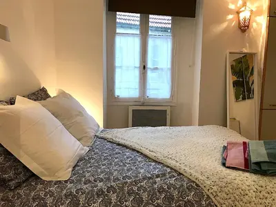 Un ou plusieurs lits dans un hébergement de l'établissement L'appartement Vaugirard
