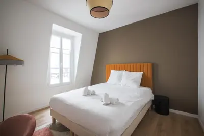 Un ou plusieurs lits dans un hébergement de l'établissement 4#Duplex 2 Pers#Paris 15#Commerce#AC