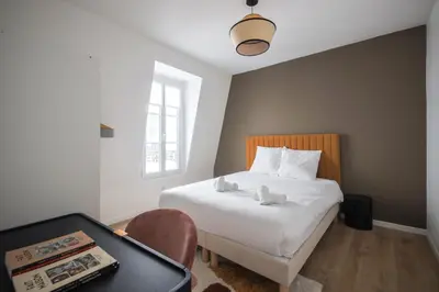 Un ou plusieurs lits dans un hébergement de l'établissement 4#Duplex 2 Pers#Paris 15#Commerce#AC