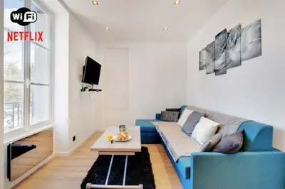 Télévision ou salle de divertissement dans l'établissement Appartement 4 personnes aux Portes de Paris