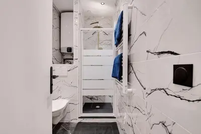 Salle de bains dans l'établissement Appartement 4 personnes aux Portes de Paris