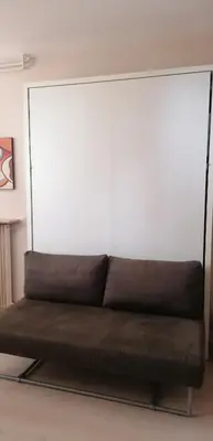 Coin salon dans l'établissement Grand studio Canal St Martin Paris 1 lit double 1pièce